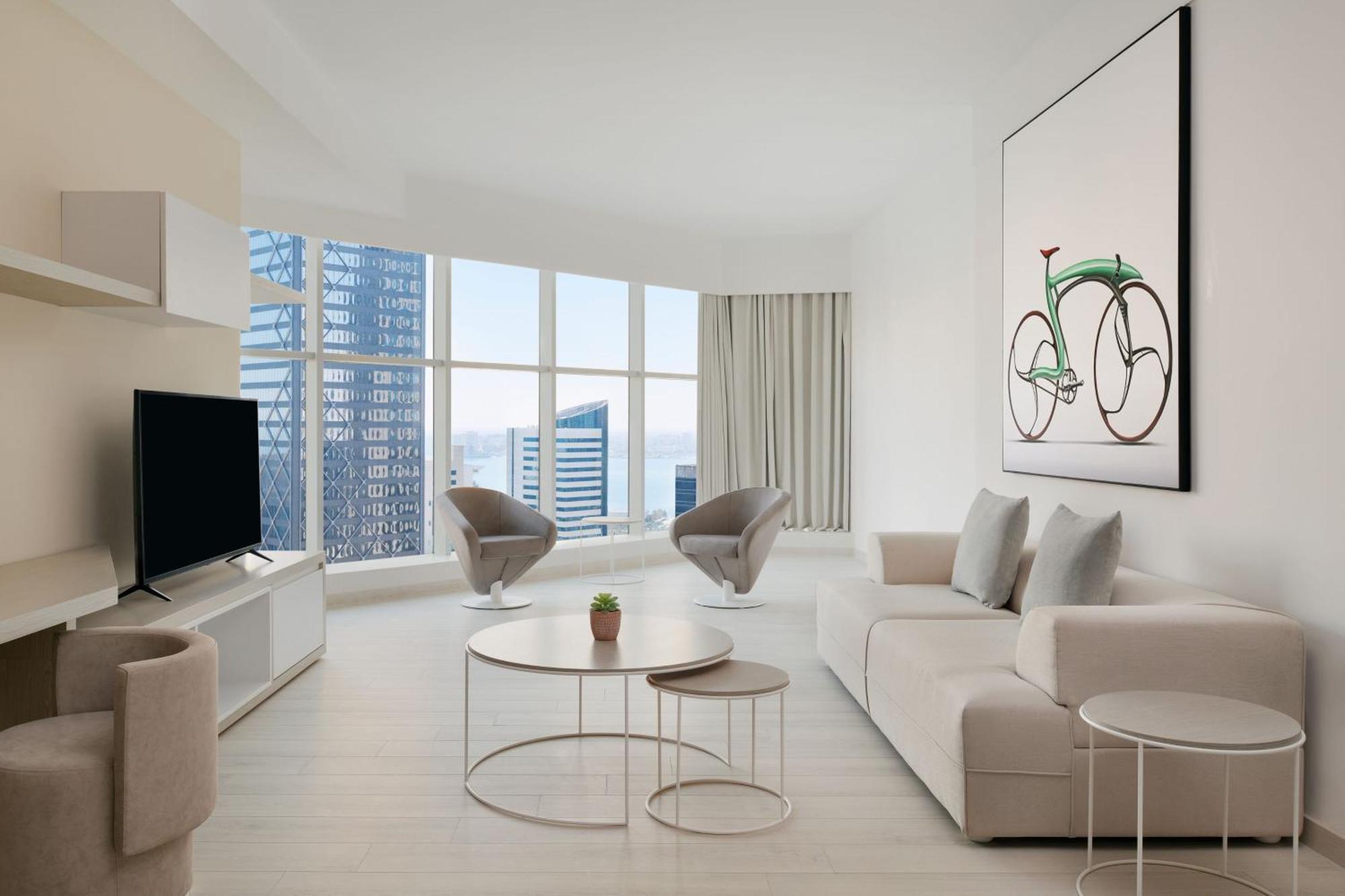 Element By Westin West Bay Doha Hotell Eksteriør bilde A living room in a condominium